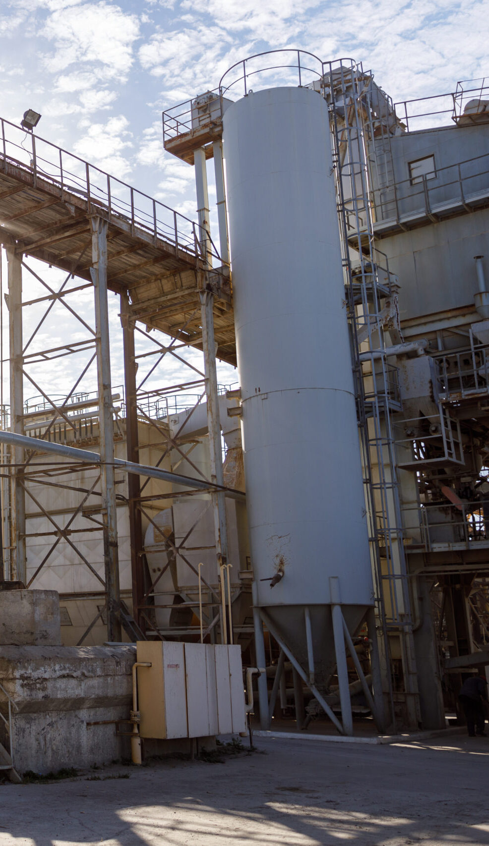 Territory of manufacturing plant with industrial buildings, storage facilities and equipment